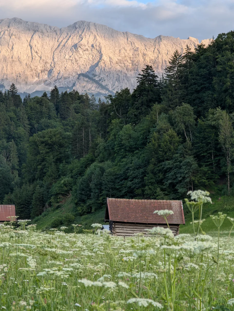 Hay barn beneath the Wetterstein massif in evening light