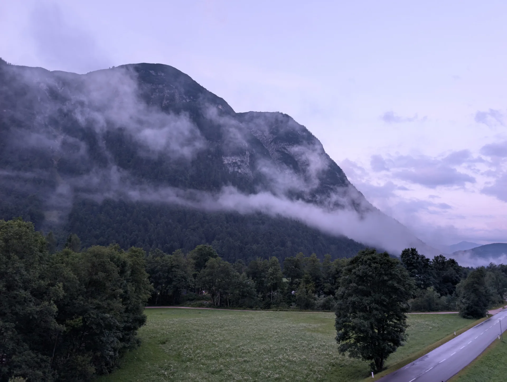 Mountain flank in morning mist