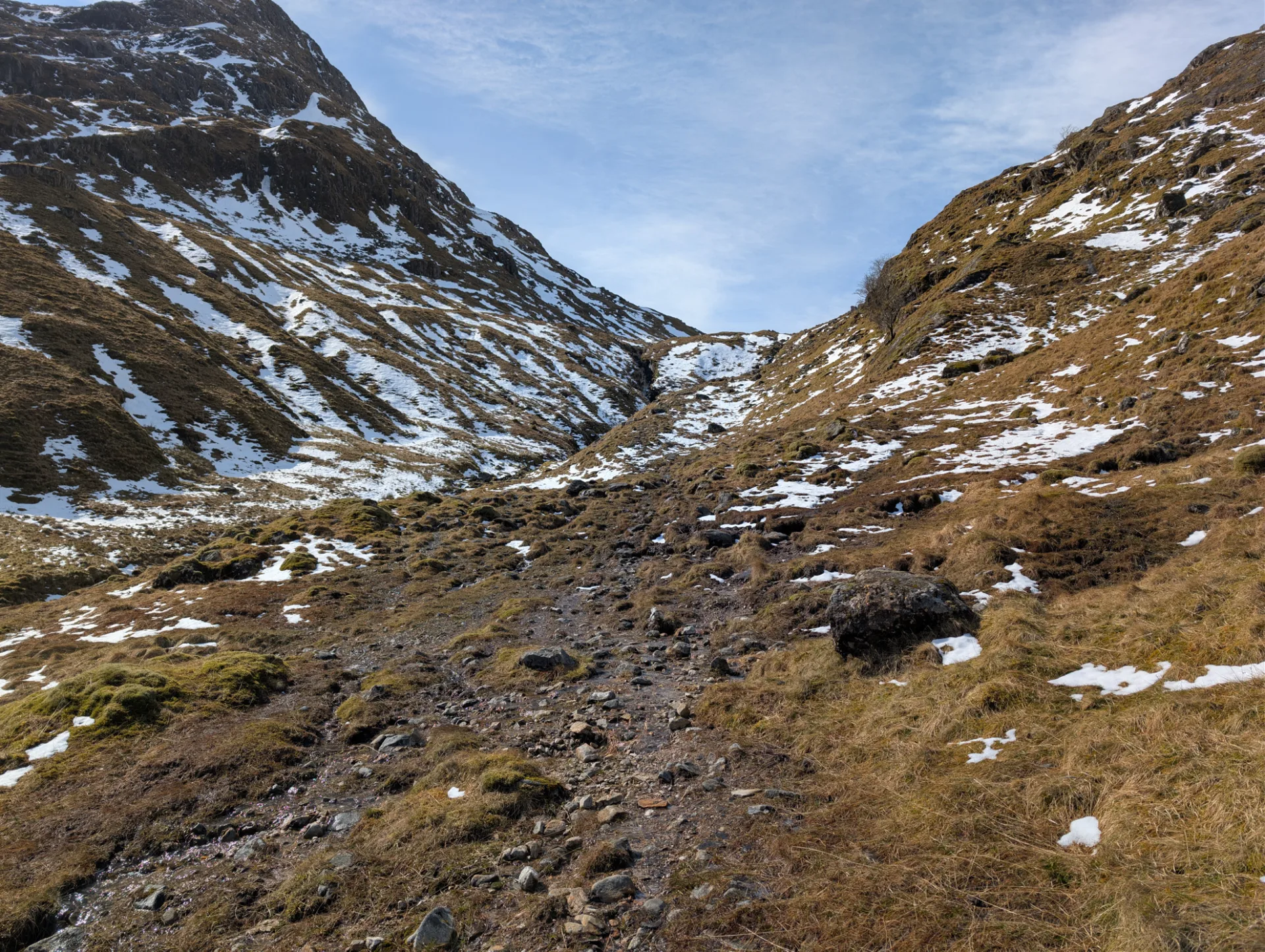 Narrow path through the snow-covered hollow