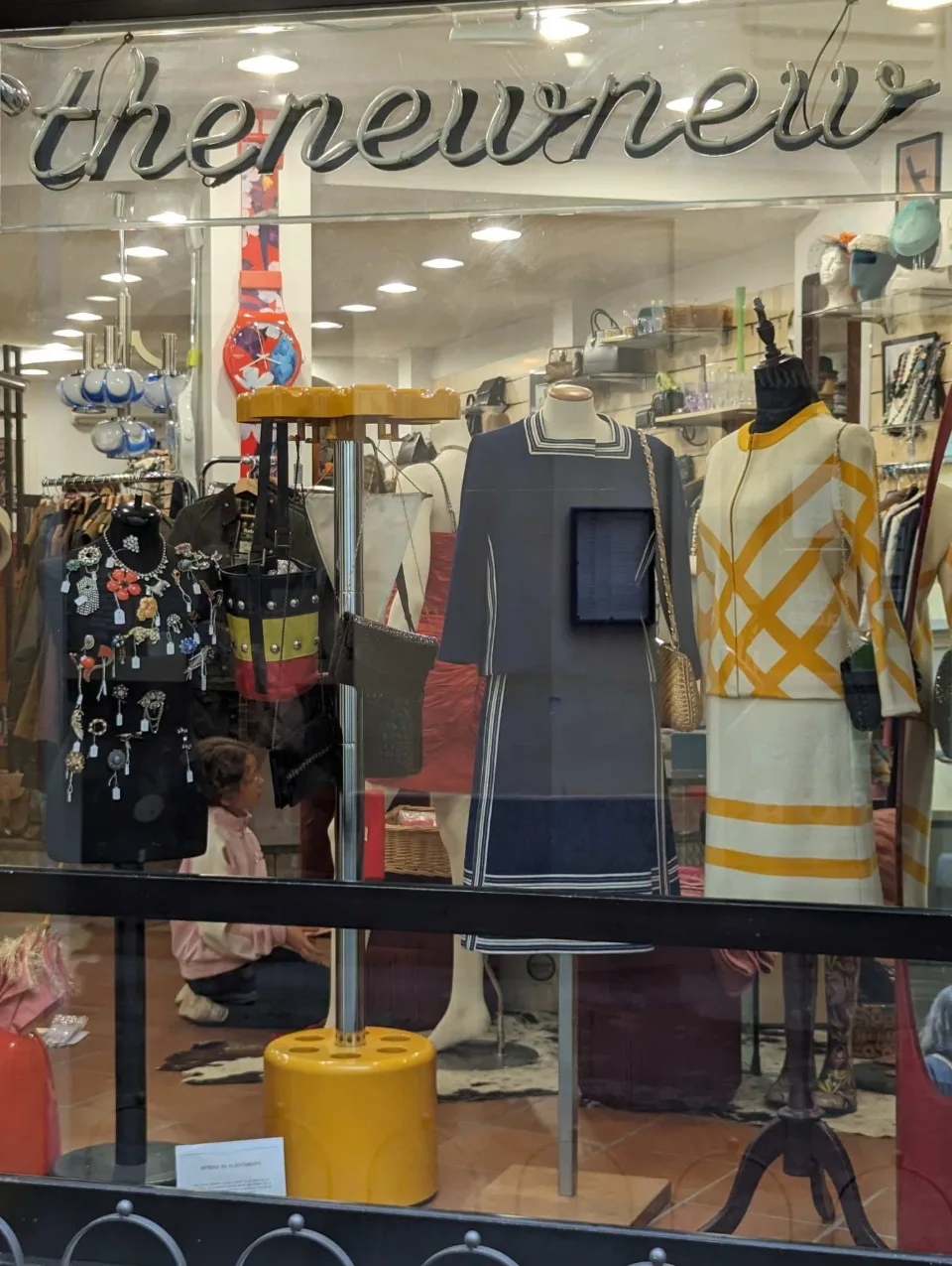 The window of a vintage boutique in the town centre