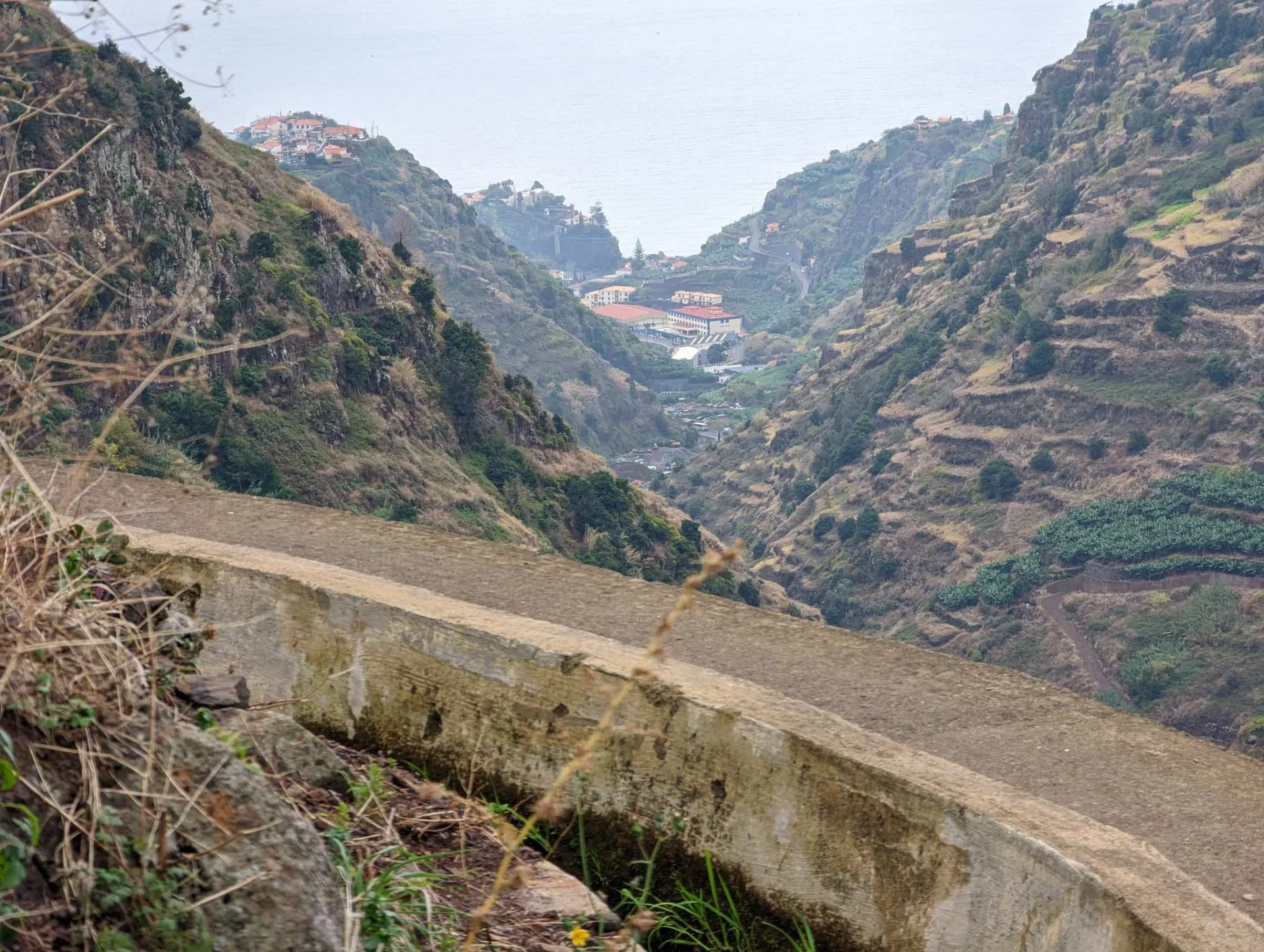 A levada high above the valley with a view to the coast