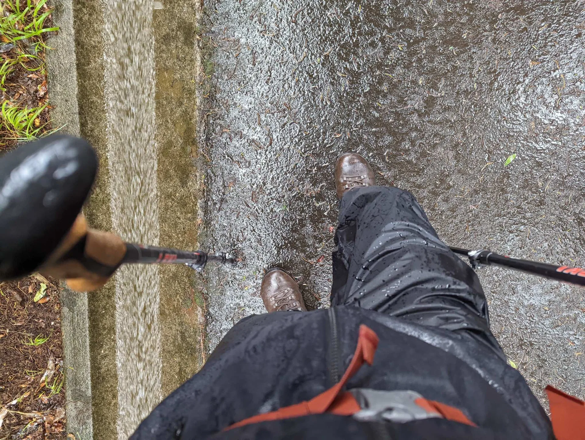 Wet boots and poles on a rainy day