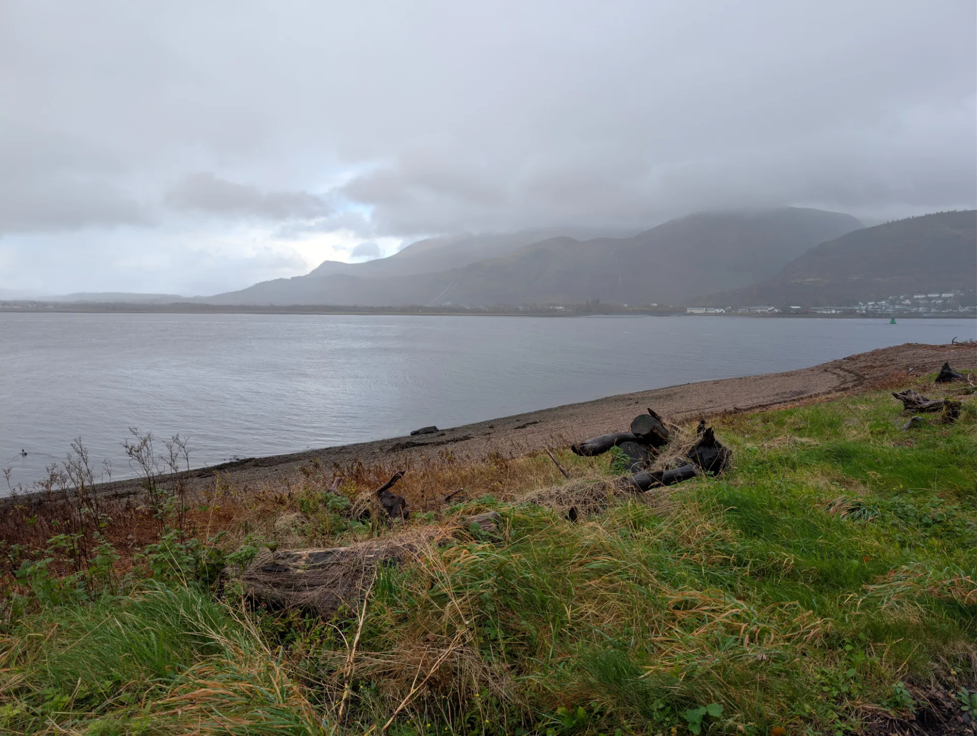 Loch shore just after landing, mountains in the mist