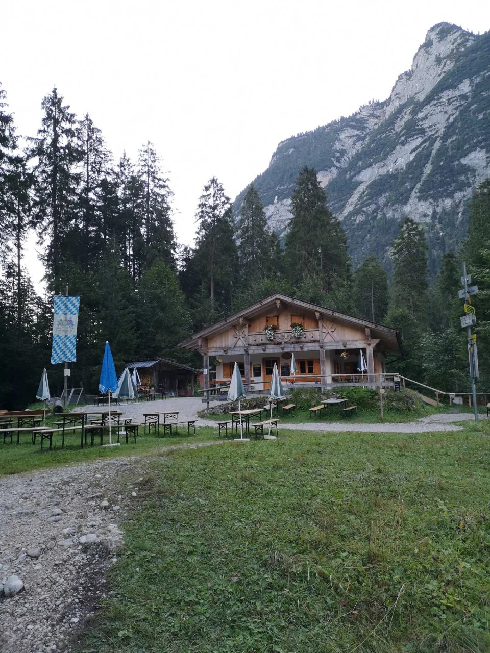 The Bockhütte (1,052 m) in the morning light, the Wetterstein walls behind it.